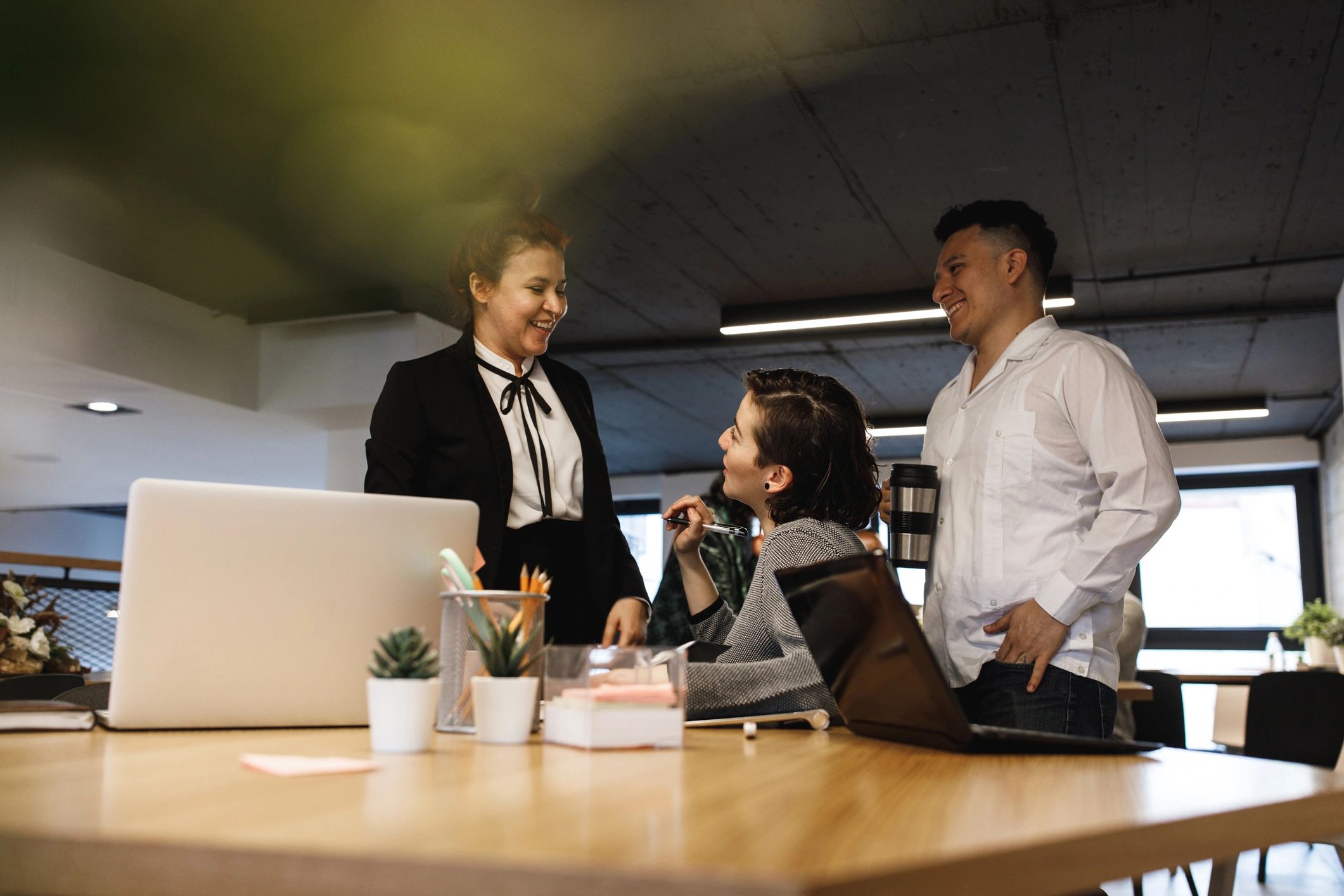 Office team discussing work together
