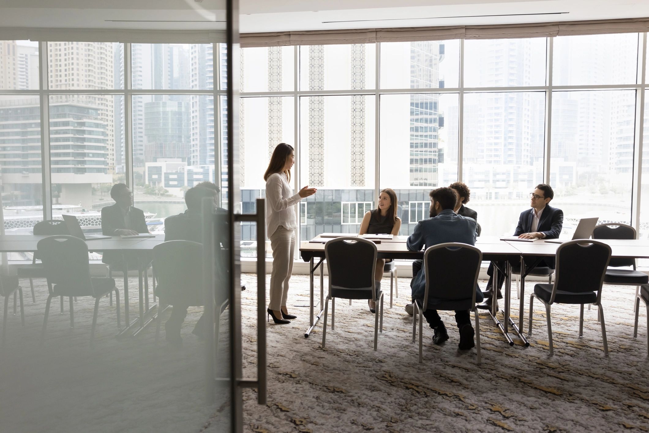 Business leaders in a collaborative strategy meeting